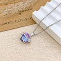 Silver necklace featuring a gradient blue and purple heart pendant with a small flower - Necklace / Silver / Purple Blue