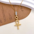 Golden Ankh cross necklace with winged design and crystal accents in polished titanium steel - Winged Ankh Cross (XL2831) / Gold