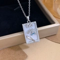 Silver The Magician tarot card necklace with blue crystals on a jewelry box - Silver White - The Magician (XL2299)