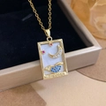 Gold tarot card necklace with crescent moon, star and clouds engraving on white shell - Gold - The Moon (XL2326)