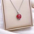 Charming ladybug pendant necklace in red enamel on a delicate silver chain - Rotatable Insect Style (XL2367) / Silver