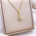 Elegant gold butterfly pendant necklace with white zircons on a minimalist cable chain - Rotatable Butterfly Style (XL3426) / Gold