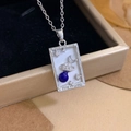 Silver Tarot The World pendant necklace featuring moon stars and a blue bead - Silver - The World (XL2764)