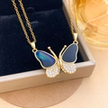 Elegant gold butterfly necklace with blue shell and black enamel wing variant - Black Blue Butterfly Gold