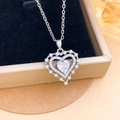 Collar elegante con colgante de corazón de circón y borde de perlas de diseño fino - Collar Corazón Perla Hueco Plata (XL4158)
