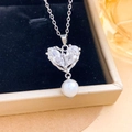 Elegante collar de corazón con circonitas de gota y una perla blanca en una cadena de plata - Collar Corazón Perla Estrella Plata (XL5260)
