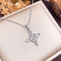 Silver-toned Celtic Witch Knot stainless steel necklace displayed on a beige jewelry box - Silver Smooth Oval Style (XL2057)
