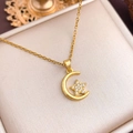 Elegant gold moon and star pendant necklace with cubic zirconia inlay on fine chain - Moon and Star (XL1864) / Gold