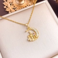 Golden moon and castle pendant necklace with cubic zirconia and red gem accent - Moon Castle (XL1932) / Gold