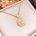 Golden moon and star pendant necklace with white zircon pavé in a jewelry box - Moon Starfish (XL2039) / Gold