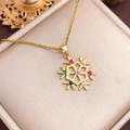 Gold snowflake necklace with colorful crystals on beige velvet jewelry box display - Colorful Snowflake (XL2677) / Gold