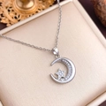 Elegant silver-tone crescent moon and star necklace with micro-pave cubic zirconia inlay - Moon Pentagram (XL2127) / Silver