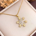 Elegant gold snowflake pendant necklace with cubic zirconia on champagne silk backdrop - Small Snowflake (XL2992) / Gold