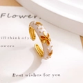 Adjustable gold flower ring with white enamel finish and orange-centered floral patterns - Sunflower Style / Sunflower White (JZ784)