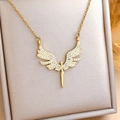 Golden angel wing necklace with sparkling zircon pavé detail in a luxury gift box - White Zirconia Angel (XL309) / Gold