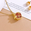 Elegant 18K gold-plated pomegranate pendant necklace featuring sparkling red zircon stones - Four-Petal Pomegranate Necklace (XL5557) / Gold