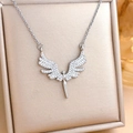 Elegant silver angel wing pendant necklace with white cubic zirconia in a jewelry box - White Zirconia Angel (XL309) / Silver