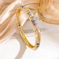 Golden hinged bangle with purple floral enamel and sparkling rhinestones on silk background - Gold Purple Pink