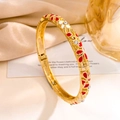Enameled gold flower bangle featuring red petals and crystals on champagne satin - Gold Red White