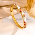 Gold-plated open bangle with red and white enamel patterns and sparkling rhinestones - Gold Red White