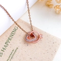 Verschlungene Herz-Ring-Halskette in Roségold mit funkelnden Zirkonia-Steinen - Liebe Auf Den Ersten Blick Stil (XL143) / Roségold