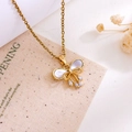 Elegante collana a farfalla dorata con madreperla bianca e pendenti in zircone - Collana con Fiocco(XL1635) / Oro