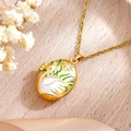 Golden oval locket necklace with white enamel swan and sparkling crystal inlay - White Swan Style (XL4999 White Swan Necklace Gold)