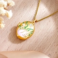 Golden oval locket necklace with pink swan enamel and white crystal on wood - Pink Swan Style (XL4999 Pink Swan Necklace Gold)