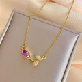 Golden tulip necklace featuring a ruby-red teardrop stone and shimmering crystal leaves - Necklace / Purple Tulip Necklace Gold