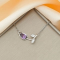 Elegant tulip pendant necklace in silver with purple gemstone on silk texture - Purple Tulip Necklace Silver
