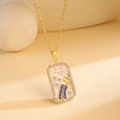 Gold rectangular Aquarius pendant necklace with blue stones and white enamel detail - Aquarius / Gold/Blue