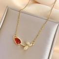 Elegant rose necklace in gold with red pear-shaped zircon and sparkling leaves - Red Tulip Necklace Gold