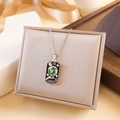 Vintage gold tarot world pendant necklace with embossed enamel detail on display stand - World Style (XL2258) - Silver