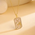 Gold Taurus zodiac necklace featuring a rectangular enamel pendant with white zircon border - Taurus / Gold/Multicolor