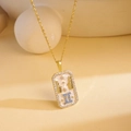 Golden Gemini zodiac necklace featuring blue zircon stones and white enamel pendant - Gemini / Gold/Multicolor