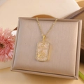 Golden zodiac necklace with white enamel pendant and crystals on jewelry box - Cancer / Gold