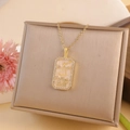 Golden Libra zodiac necklace with rectangle zircon pendant on jewelry box - Libra / Gold