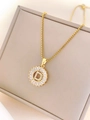 Elegant gold titanium necklace featuring a sparkling letter D pendant with zircon stones - Letter D / Gold