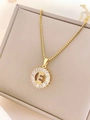 Elegant gold titanium steel necklace featuring a crystal-encrusted letter E pendant charm - Letter E / Gold