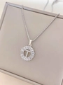 Silver titanium steel necklace with T-letter pendant and zircon inlay on a jewelry box - Letter T / Silver