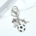 Detail of silver soccer keychain with I LOVE SOCCER charm and jersey pendant - Antique Silver Soccer Heart Clasp Quad