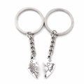 Detail of Best Friends split heart keychains in vintage silver finish with engraved text - Best Friends Engraved Antique Silver Style