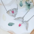 Silver angel wing necklace featuring a red teardrop stone and zircon pave setting - Soaring Wings (XL678) / Silver
