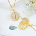 Golden sun medallion necklace with openable wings and sparkling white zircon stones - Sun (XL1160) / Gold