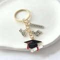 2026 graduation keychain featuring black mortarboard cap and silver school charms - 2026-2# Style