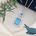 Silver necklace featuring rectangular blue gemstone pendant with cubic zirconia halo - Cross Chain (XL123) / Sea Blue (Silver Tone)