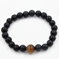 Men's matte black beads bracelet featuring a natural brown tiger eye stone centerpiece - Matte Black Tiger Eye