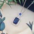 Silver necklace featuring a rectangle dark blue sapphire pendant with zircon halo - Cross Chain (XL123) / Blue (Silver Tone)