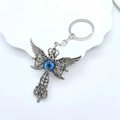 Porte-clés vintage en métal avec croix ailée et pendentif œil bleu décoratif - Ailes De Croix Œil Bleu