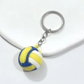 Porte-clés de volley-ball sportif en caoutchouc souple jaune, bleu et blanc décoré - Volleyball en Colle Souple